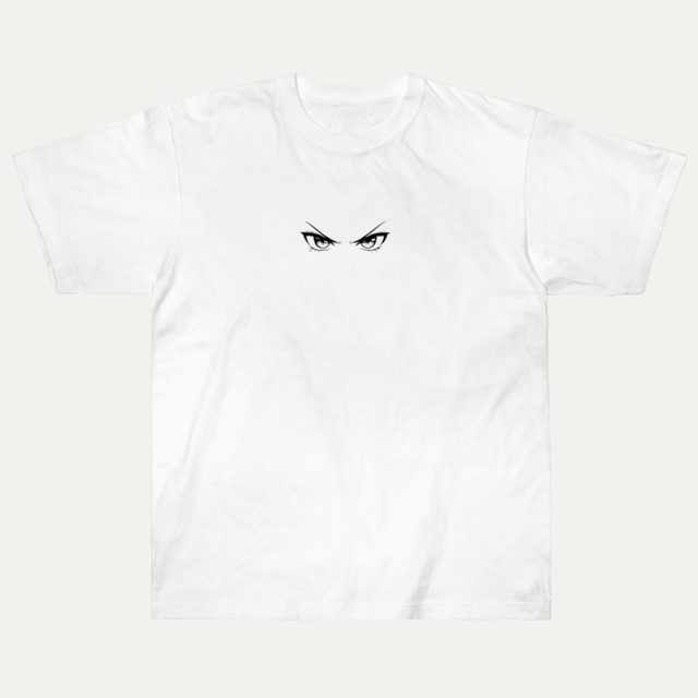 鋭い目のデザインのTシャツ
